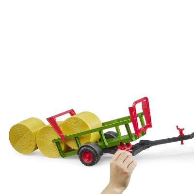 Žaislinė BRUDER šieno ritinių priekaba 02204